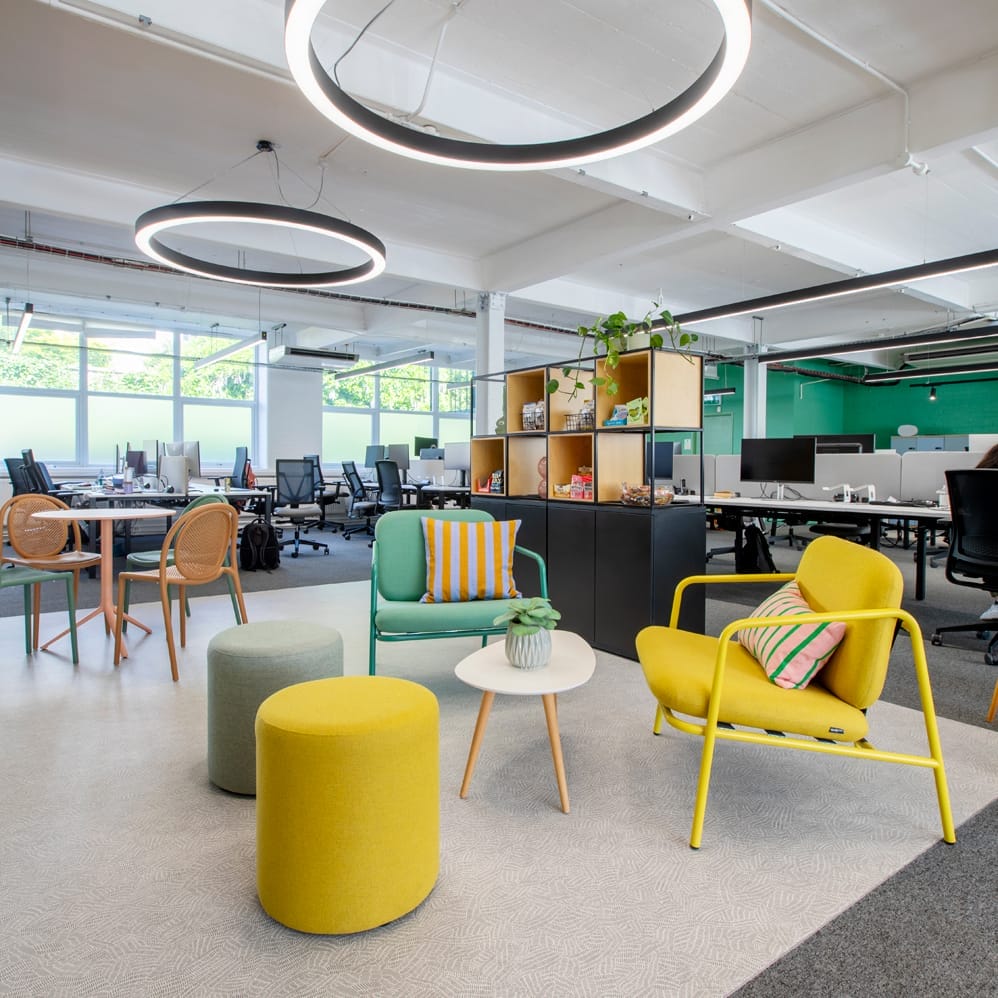 Office Interior Design in Brighton and Hove, featuring colourful furniture and timber slat partition. Stickland Wright Architecture and Interior Design